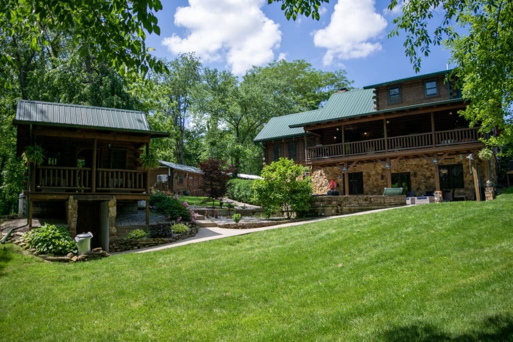 Canine Academy campus in Lancaster, Ohio with open fields and timber lodge